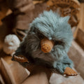Produktbild Baby Niffler Plüsch Figur 22 cm grau - Phantastische Tierwesen