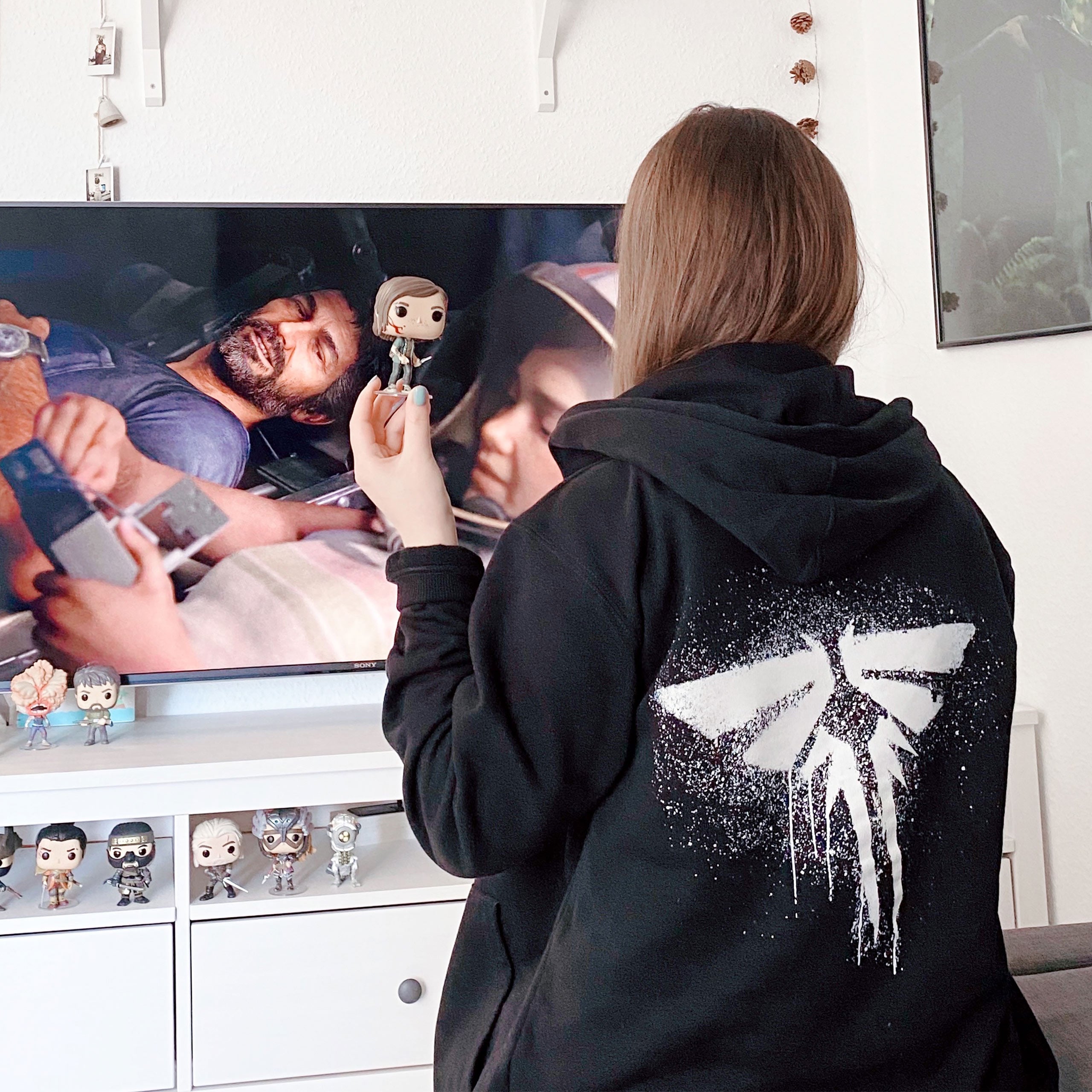 Produktbild The Last of Us - Fireflies Logo Kapuzenjacke schwarz