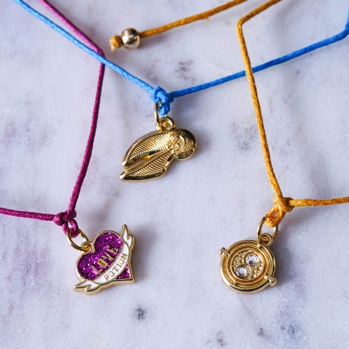 Produktbild Harry Potter - Armbänder 3er Set mit Anhänger