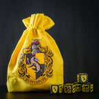 Produktbild Harry Potter - Hufflepuff RPG Würfel Set 5tlg mit Würfelbeutel gelb