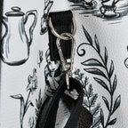 Produktbild Alice im Wunderland - Teeparty Crossbody Tasche